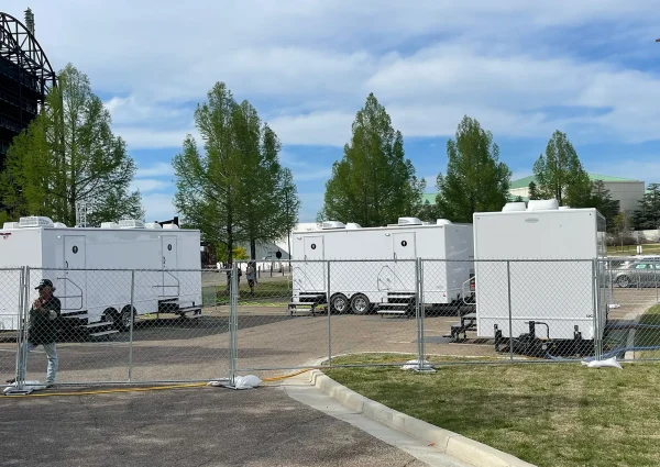 barricade rentals in use for luxury restroom trailers